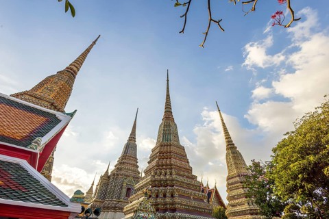Wat Pho Temple is Bangkok's oldest Buddhist monastery near the Grand Palace. Four chedis are among