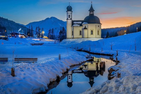 Seekirchl with Hocheder 2797m at dusk in winter, Seefeld, Seefeld Plateau, Tyrol, Austria, Europe