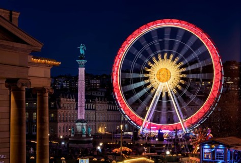 Christmas market with Christmas pyramid, Ferris wheel, New Palace, Jubilee Column, Concordia,