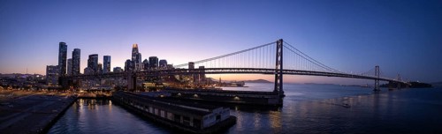 Panoramic San Francisco financial district skyline in city downtown near Oakland Bay Bridge