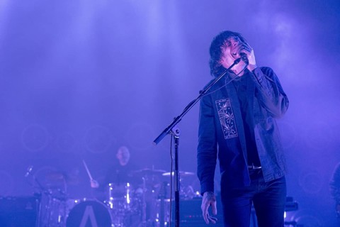 Dave Pen, singer and guitarist of Archive live at the Tempodrom in Berlin on 21/02/2025