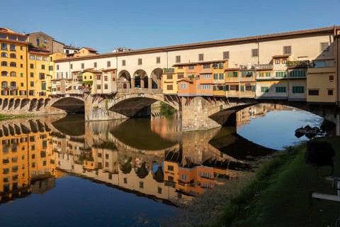 Ponte Vecchio and reflection in the river Arno, Florence, Tuscany, Italy, Europe