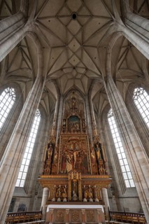 High altar, completed in 1642, replaced by neo-Gothic carvings in 1856, late Gothic hall church of