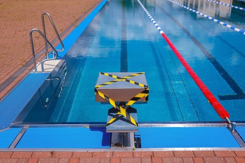 Hagen, North Rhine-Westphalia, Germany - Blocked-off starting block at the edge of the swimming