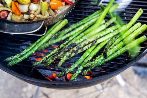 Barbecue, kettle grill with vegetarian and vegan barbecue grills such as grill pan and green