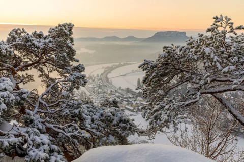 Winter magic at the Bastei bridge, view of the Elbe valley shortly in front of sunrise, Saxon