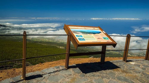 Panorama of the west coast with trade wind clouds from the Mirador El Valle viewpoint, Parque