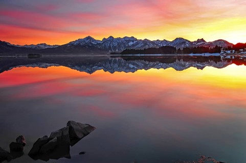Sunset at the Forggensee near Füssen in the Allgäu, on the right the Aggenstein (1986 m), Bavaria,