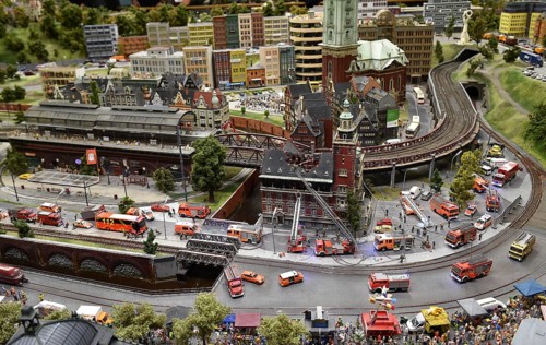 Fire brigade extinguishes burning house at Miniatur Wunderland Hamburg, Germany, Europe