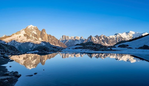 Mountain landscape in the evening light, water reflection in Lac Blanc, mountain peak, Aiguille