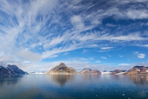 Luciapynten, mountain with steep sea cliffs in Hornsund fjord in summer, Svalbard, Spitsbergen,