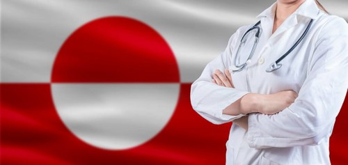 Doctor with crossed arms on Greenland flag. Greenland Health and Care concept. Female doctor on