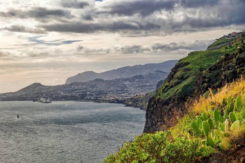 Ponta do Garajau viewpoint at the statue of Christ, Cristo Rei statue, cliffs, weather mood,