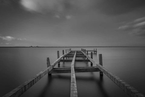 View of a partially dismantled jetty at Steinhuder Meer, Wilhelmstein, long exposure, black and