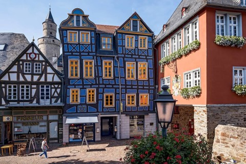 The leaning house, half-timbered house, colourfully painted, witches' tower, town hall, King Adolf
