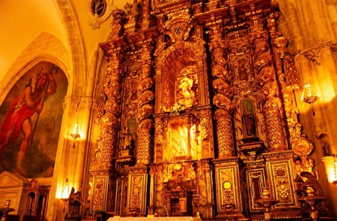 Elaborately decorated gold altar in the cathedral church of Santa Maria La Mayor, Ronda, Andalusia,