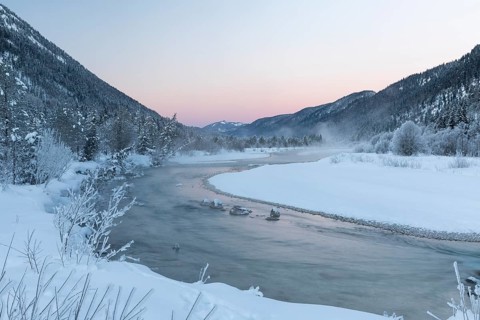 Isar valley in winter at temperatures of minus 18 degrees Celsius. Snow covered landscape with the