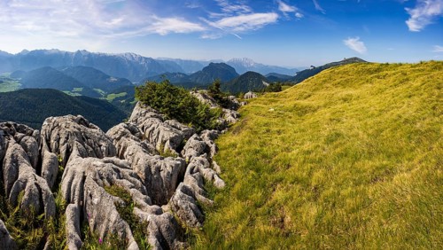 At the summit of Alpbichl with a view of the Lammertal and Tennengebirge mountains, Osterhorn
