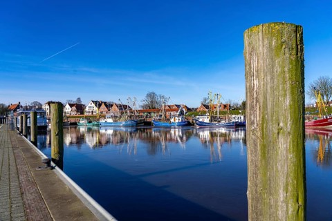 The fishing village of Greetsiel, historic fishing harbour, with the largest shrimp cutter fleet in