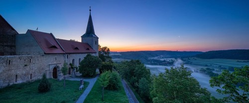 Monastery church Zscheiplitz at sunrise, morning fog in the Unstrut valley, Freyburg,