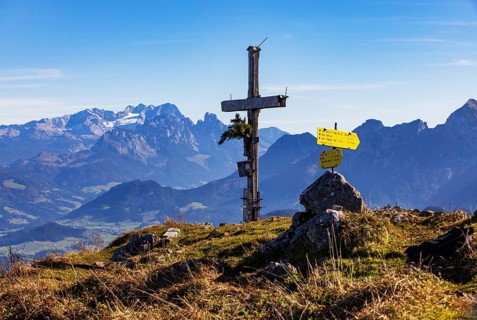 Old summit cross on the Schwarzer Berg with a view of the Dachstein massif, Golling,