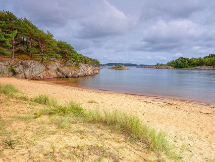 Kanelstranda, coast in Furulunden nature park Park by the Mannefjord, Mandal, Norway, Europe