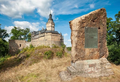 Falkenstein Castle in the Harz Mountains, in front the memorial stone for Eike von Repgow,