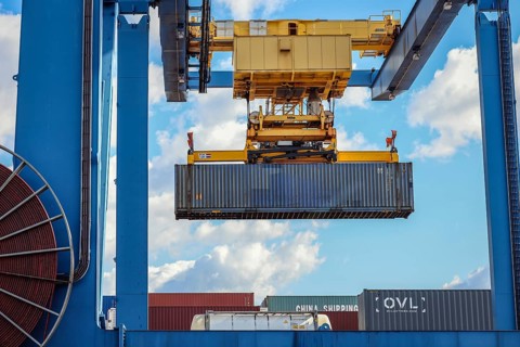 Duisburg, North Rhine-Westphalia, Germany, containers are loaded onto a goods train in the port of
