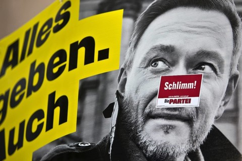 Sticker Schlimm by Die Partei on an FDP election poster with portrait of Christian Lindner, Bochum,