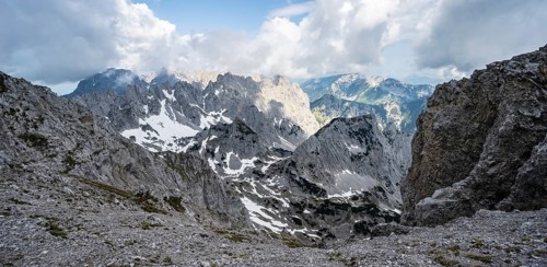 View of rugged, rocky mountain landscape, view from the summit of the Ackerlspitze, mountain peak