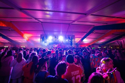 Large crowd in a festively lit tent at a music event, carnival, Schlagerkuchen Donzdorf, district