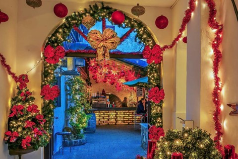 Christmas decorated passage to the mulled wine stand in the side passage at the Christmas market,