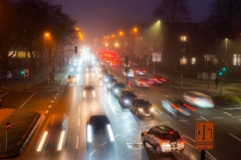 Dense fog, with visibility sometimes less than 100 metres, city centre traffic at rush hour on