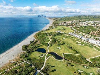 The La Hacienda Links Golf Resort at the Mediterranean Sea with the Rock of Gibraltar (British) in