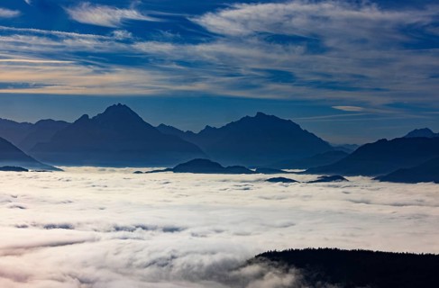 View from Schwarzenberg to a sea of fog in the Salzach valley with Watzmann, Osterhorn group,