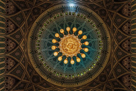 Dome and illuminated chandelier in the Sultan Qaboos Mosque, Muscat, Arabian Peninsula, Sultanate
