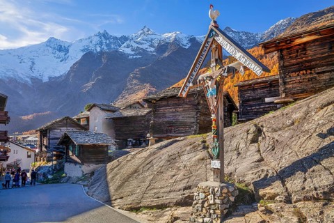 Typical Saas Valley wayside shrine and granary on the edge of the village with Dom 4545m and