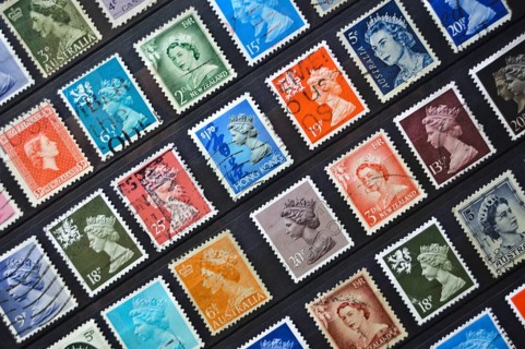 Old postage stamps from various english speaking countries, they depict the queen Elizabeth II.