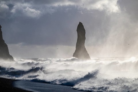 Rock needle in stormy surf, Vík í Mýrdal, Suðurland, Iceland, Europe