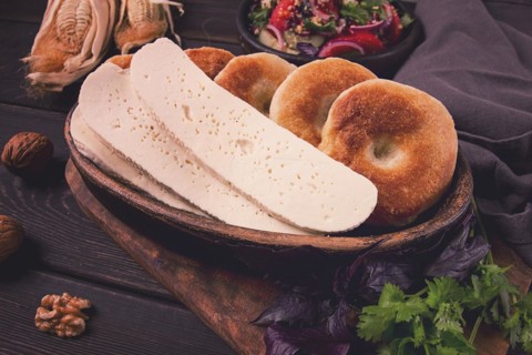 Mchadi, corn tortillas, traditional Georgian dish, corn bread, with Imeretian cheese, homemade, no