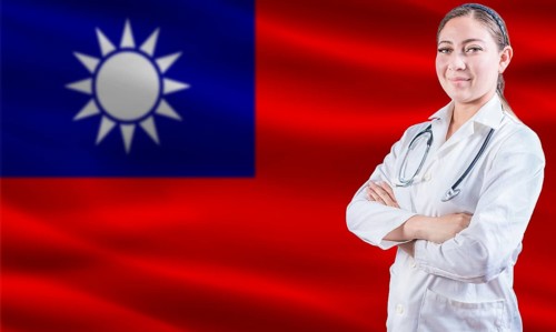 Female Doctor On Taiwanese Flag. Doctor With Crossed Arms On Taiwanese Flag. Taiwan Health And Care