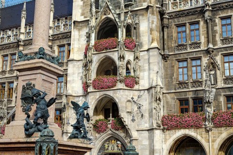 Depiction of allegorical battles against monsters, sculptures at the foot of St Mary's Column, with