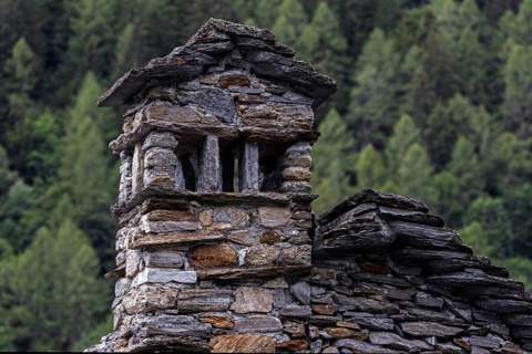 Chimney of a typical Ticino stone house, Mogno, near Fusio, Lavizzara, Canton Ticino, Switzerland,