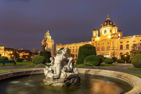 Fountain on Maria-Theresien-Platz and the Natural History Museum in Vienna at dusk, Austria, Europe