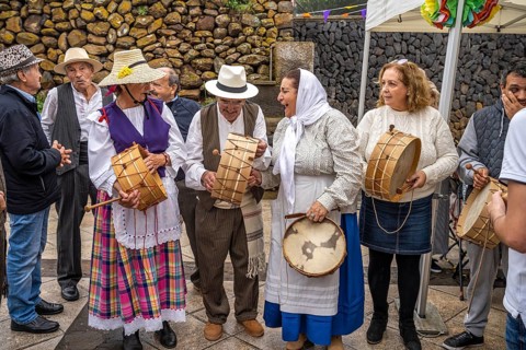 Traditionally dressed elderly musicians during the Bajada in Arure, La Gomera, Canary Islands,