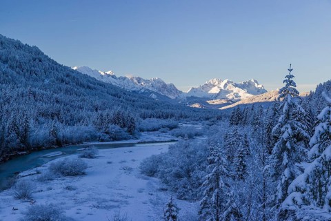Isar valley in winter at temperatures of minus 18 degrees Celsius. Snow covered landscape with the