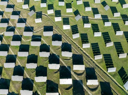Rows of solar panels at a photovoltaic plant near town of Espejo. Aerial view. Drone shot. Córdoba
