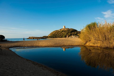Sandy beach beach and blue sea, sunrise, Spiaggia di Su Portu, Torre di Chia, Chia, south coast,