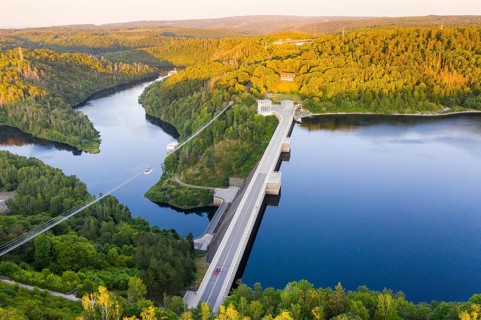 Aerial view of the Rappbode dam, dam wall and suspension bridge by Harzdrenalin, Oberharz am