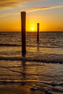 Intense sunset on the west beach of Norderney, Lower Saxony, Germany, Europe